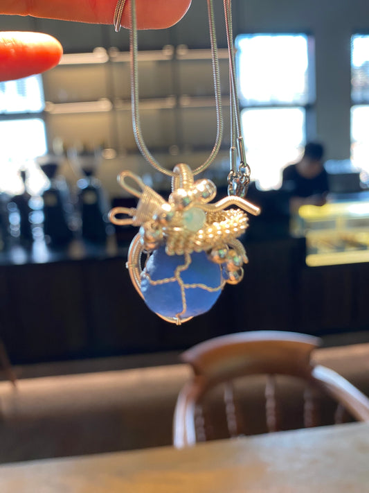 Which girl would refuse a sparkling blue heart necklace? Each one is made with ingenuity. It sparkles in the summer and looks amazing with a sweater chain in the winter. Give a unique necklace to your bestie or friend.